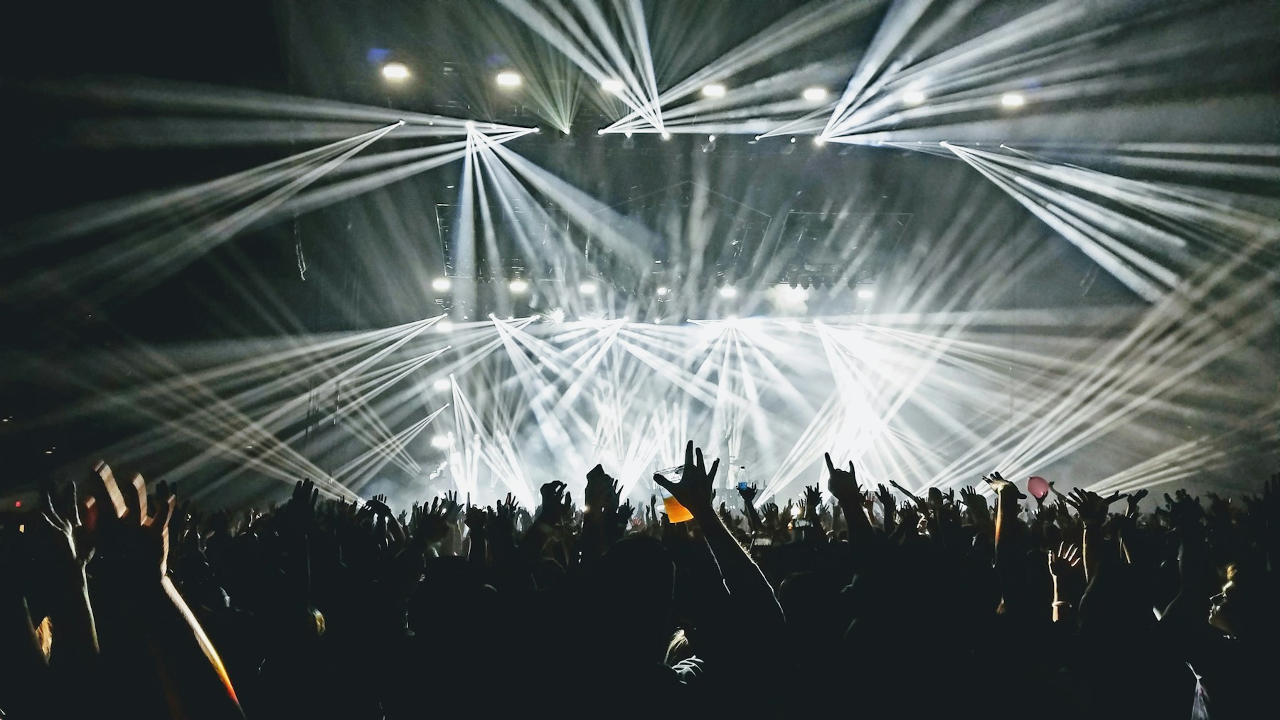 Concert lights over an audience; reference photography